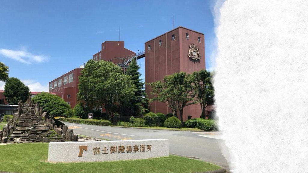 Fuji Gotemba Distillery beneath a clear blue sky